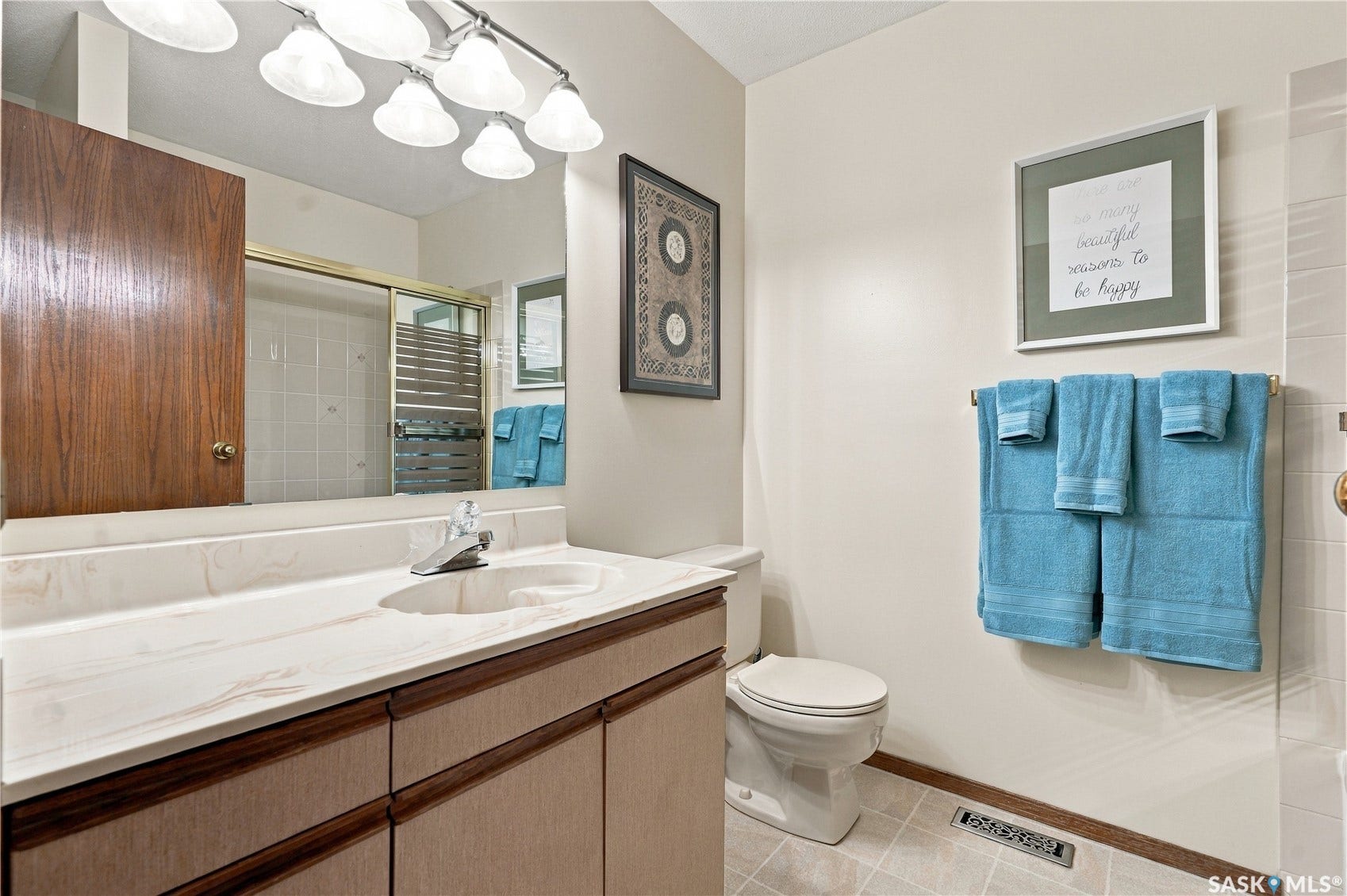 Double vanity with integrated sinks and chrome fixtures