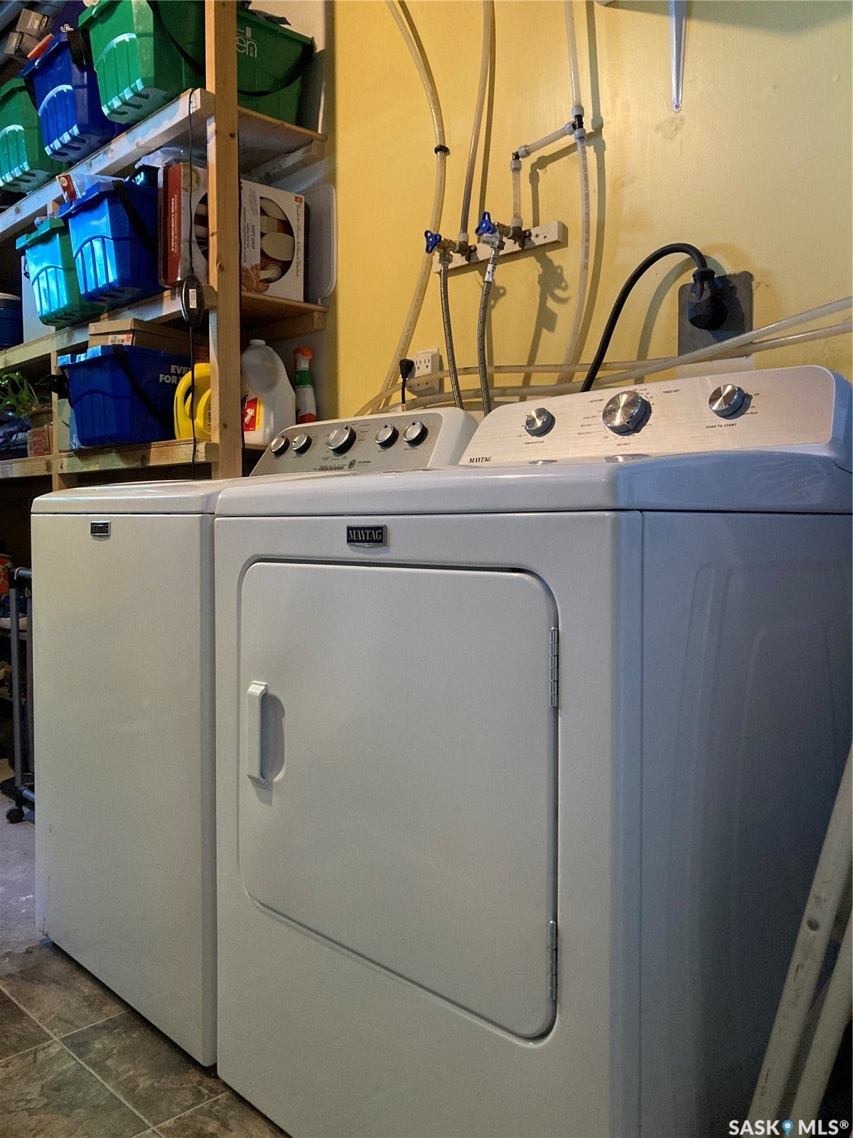 Laundry area with a full-size washer and dryer