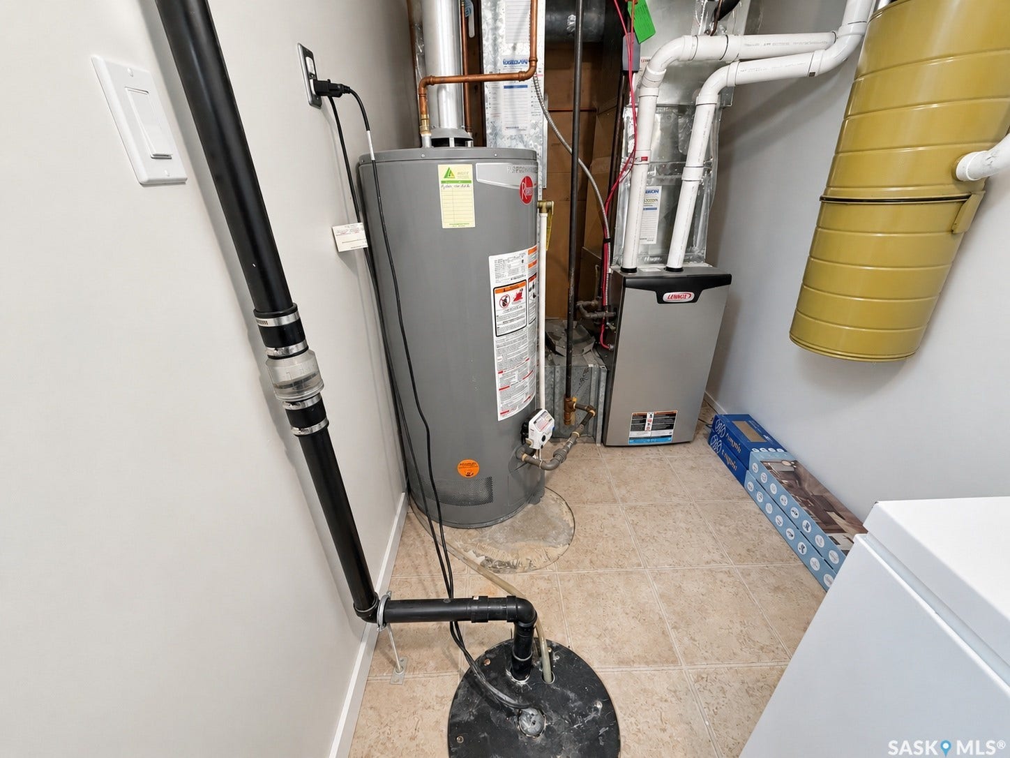 Water heater, furnace, sump pump, and tiled flooring