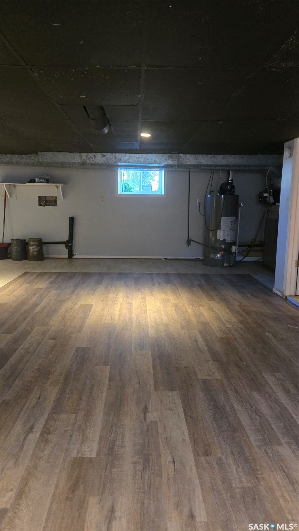 Wood-finish flooring with a low-profile window