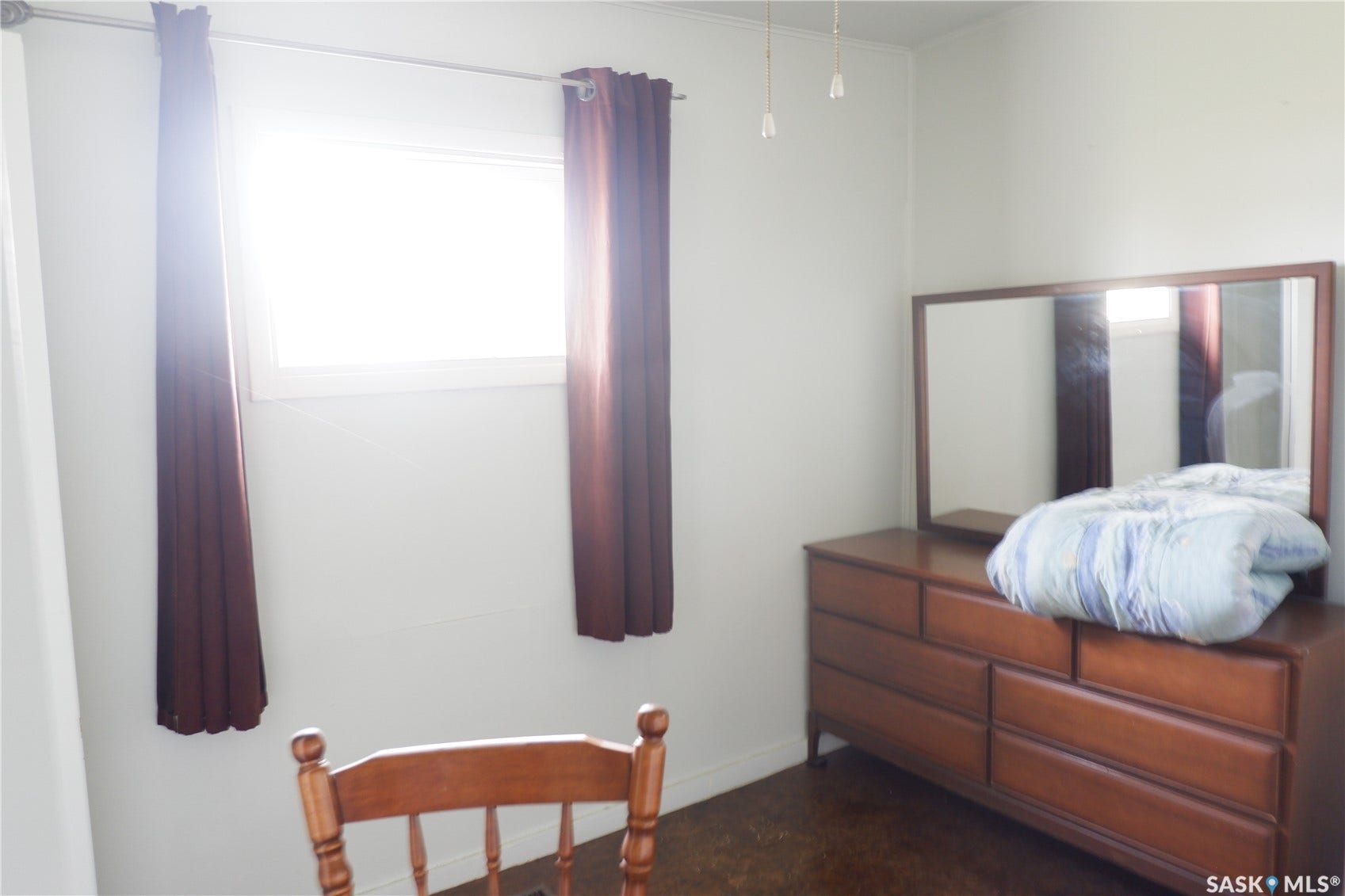 Bedroom with baseboards