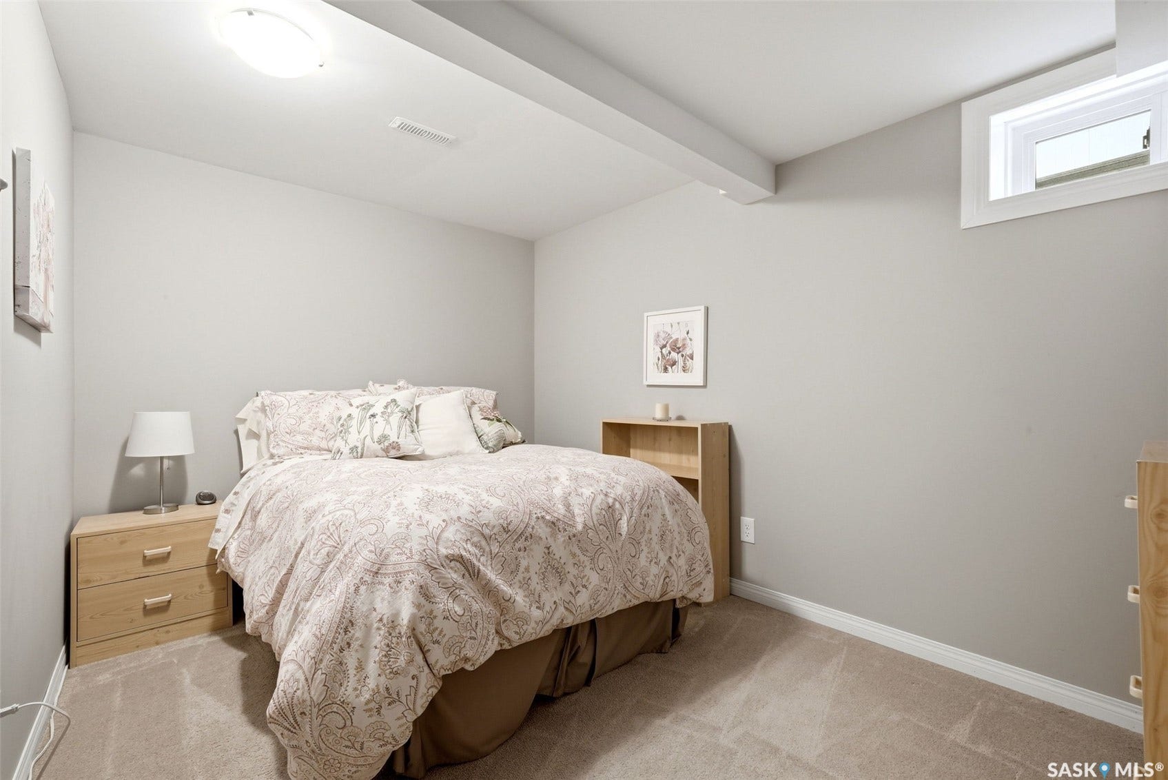 Bright and inviting room currently used as a bedroom. Please note that the existing windows may not meet current egress requirements. Buyers are encouraged to verify bedroom designation and applicable requirements with the appropriate authorities.