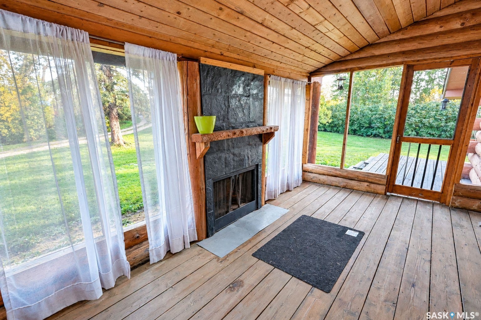 Wood-paneled ceiling with exposed beams