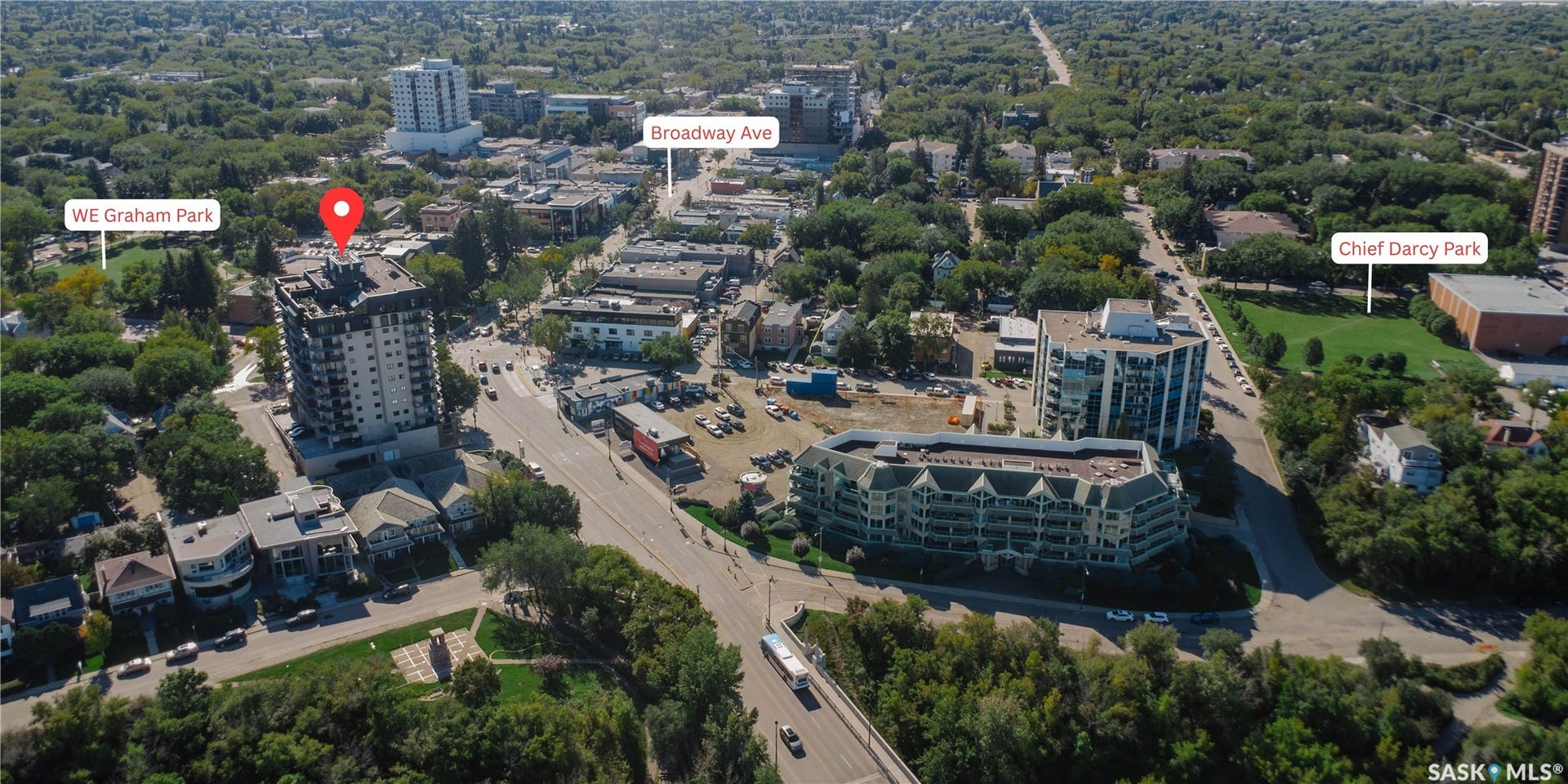 Aerial perspective showcasing a multi-story building within an urban setting