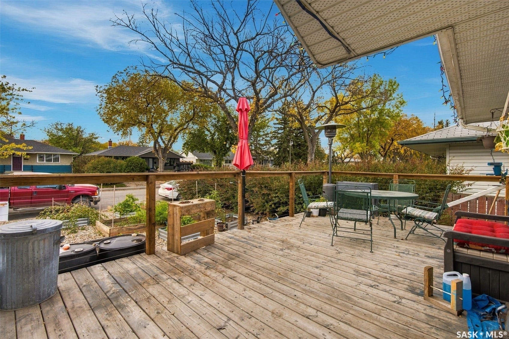 Expansive wood deck with wood railing