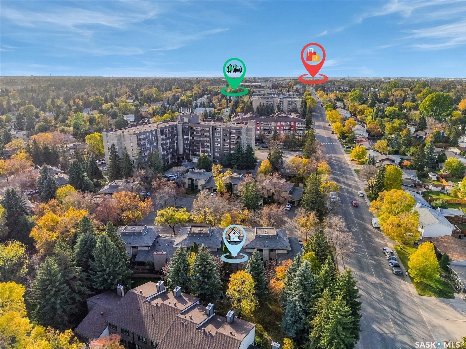 Aerial perspective showcasing a tree-lined street and surrounding buildings