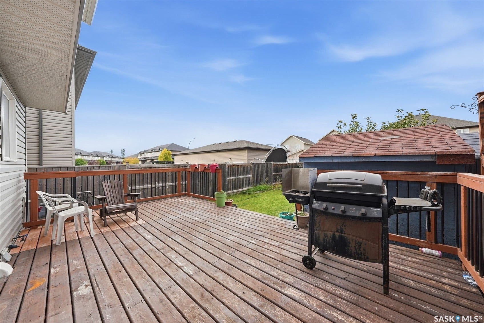 Expansive wooden deck with coordinating railings