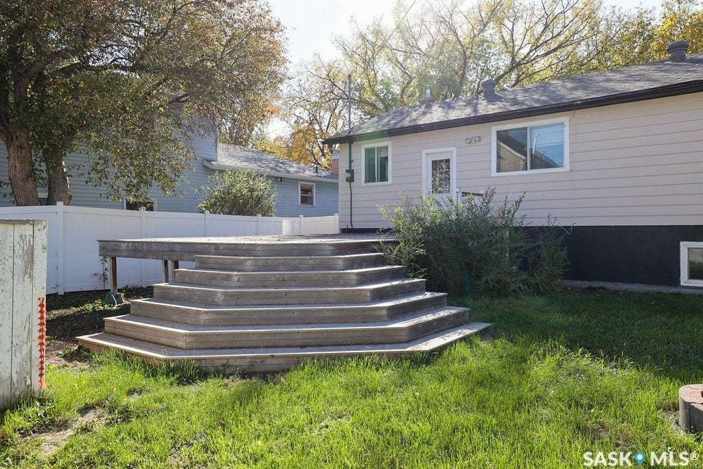 Multi-tiered wood deck with privacy fencing