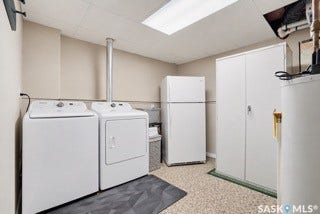 Drop ceiling with recessed lighting, light-toned wall paint, speckled flooring, and built-in storage cabinet-- AI generated