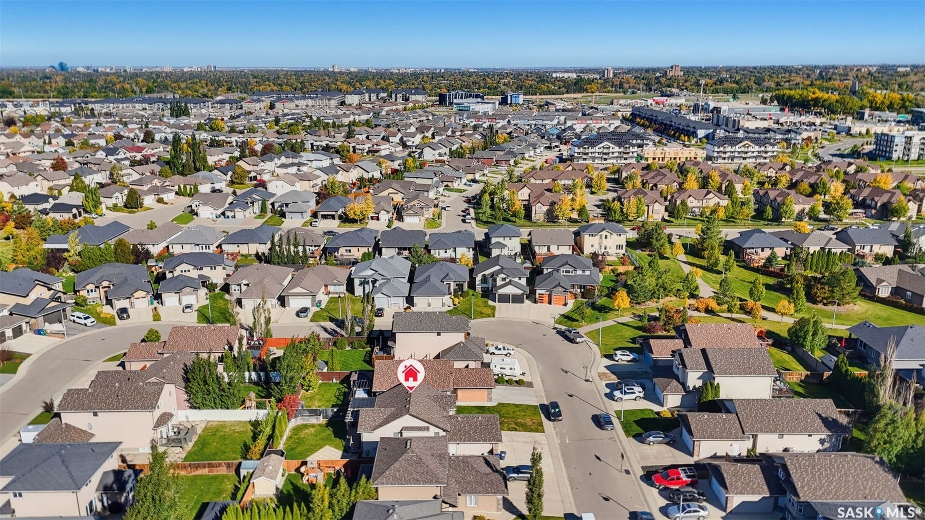 Residential neighborhood featuring a mix of single-family homes and multi-story buildings