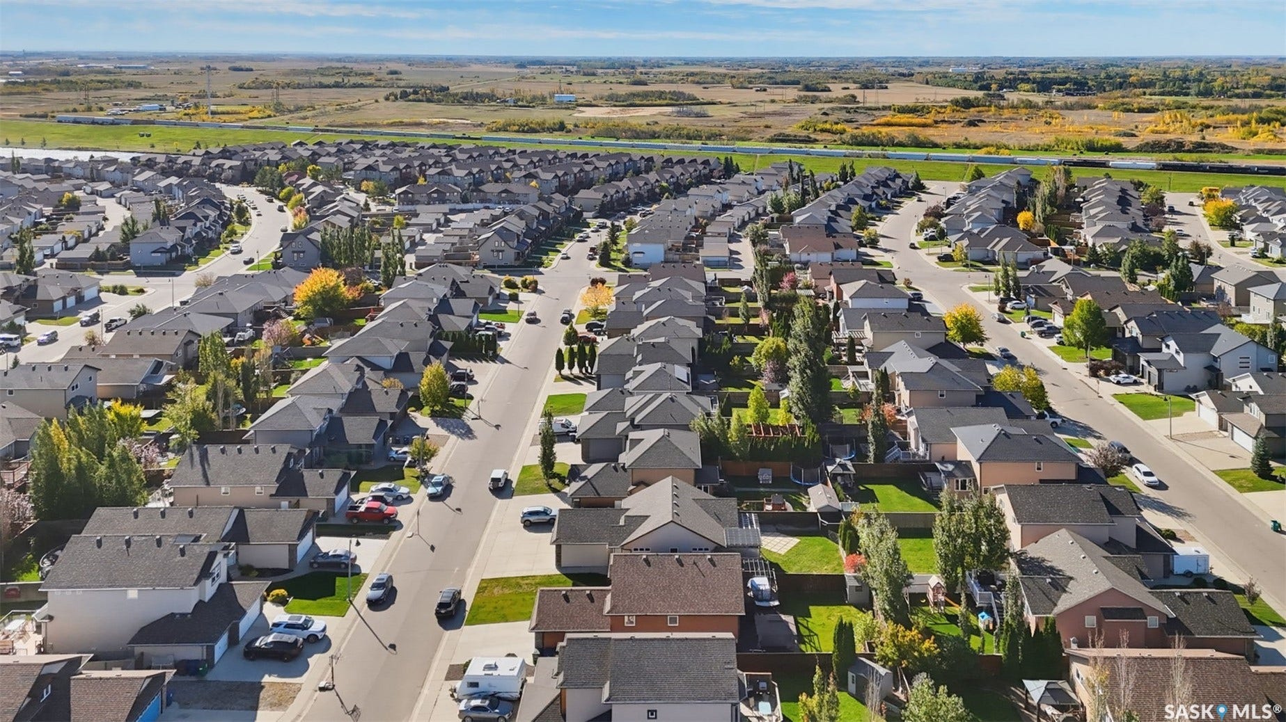 Expansive residential neighborhood featuring paved streets and varied home designs