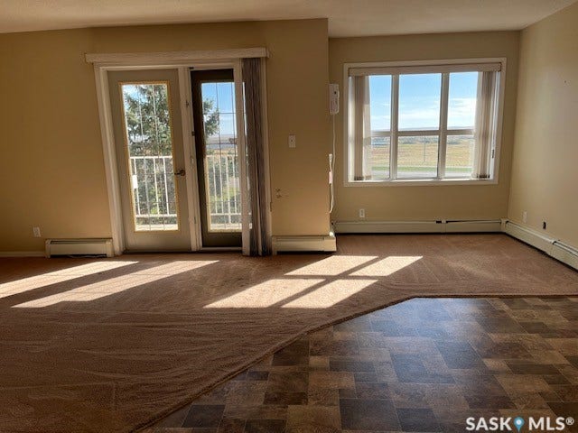 Dual flooring with patterned vinyl and carpet