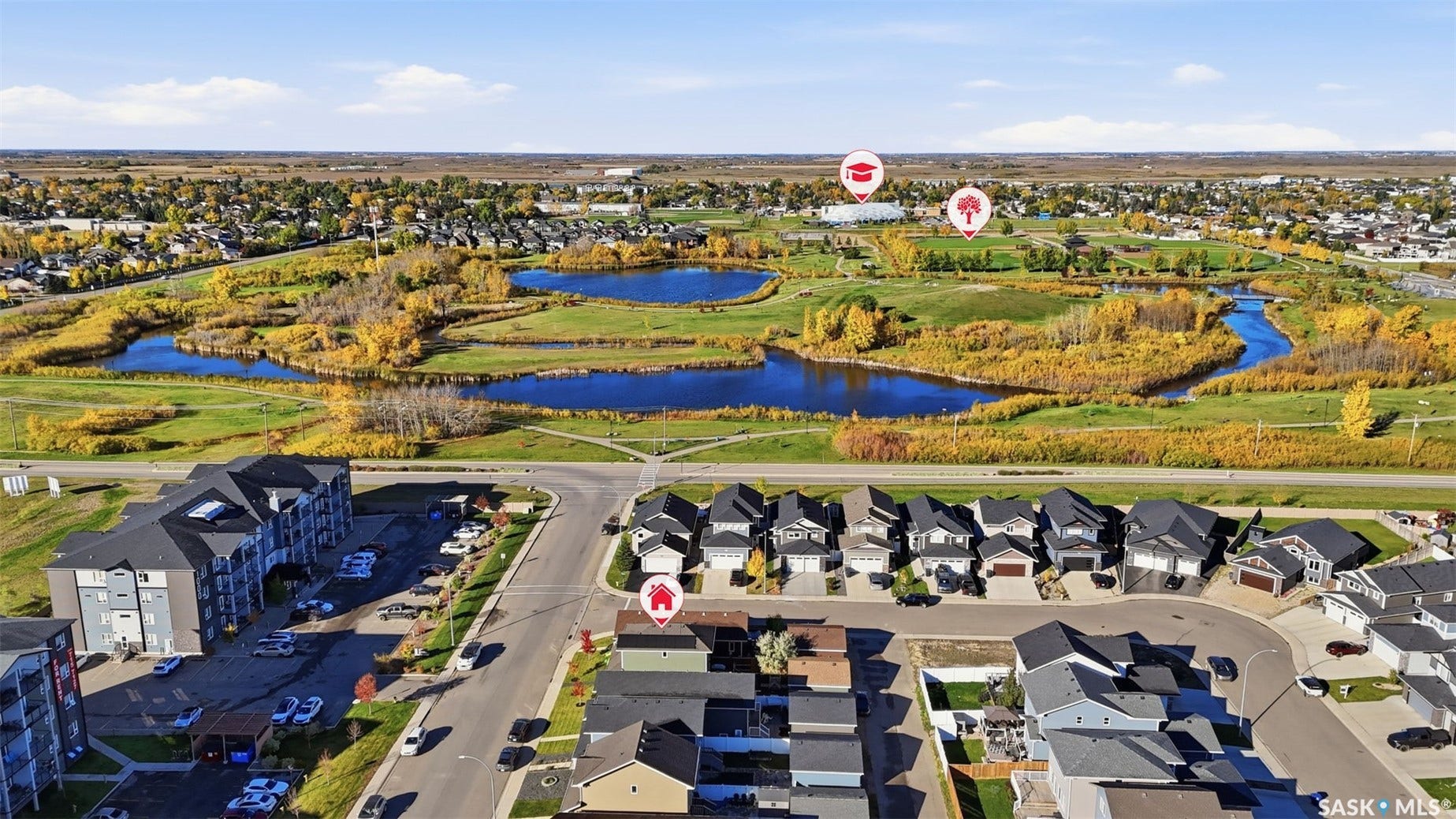 Neighborhood setting featuring a winding river and multiple bodies of water
