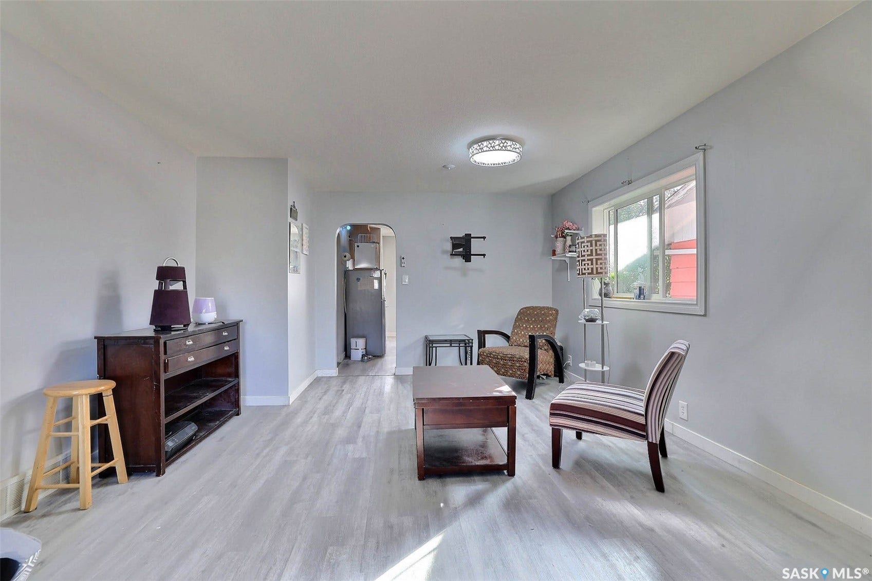 1021 Campbell Street, Regina SK S4T 5P5 Light-toned wood-finish flooring throughout