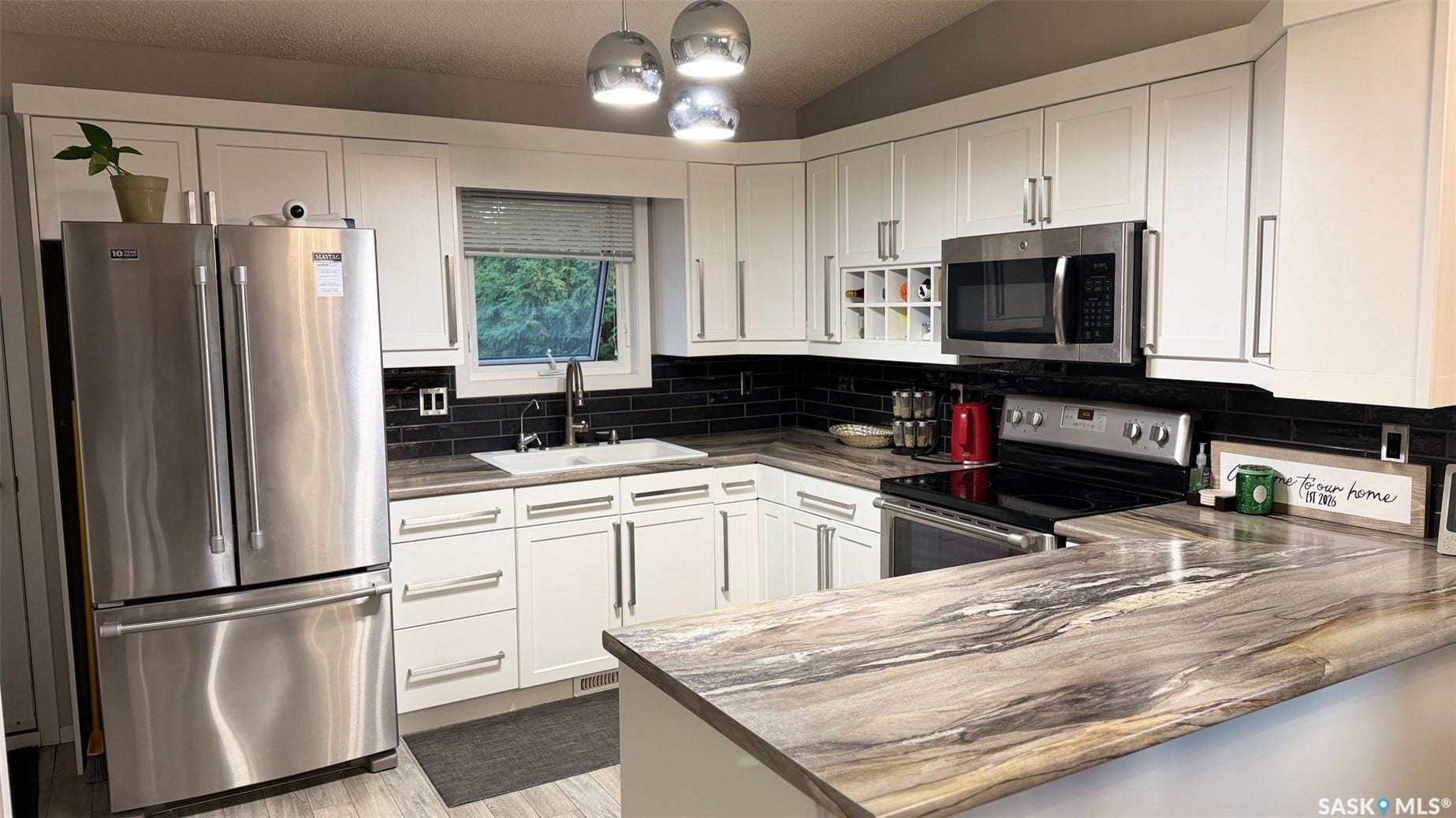 White cabinetry with contemporary hardware