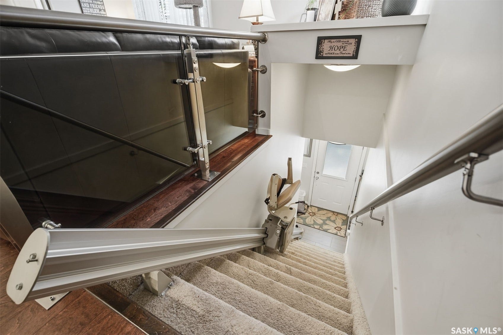 Carpeted staircase with an integrated stair lift system