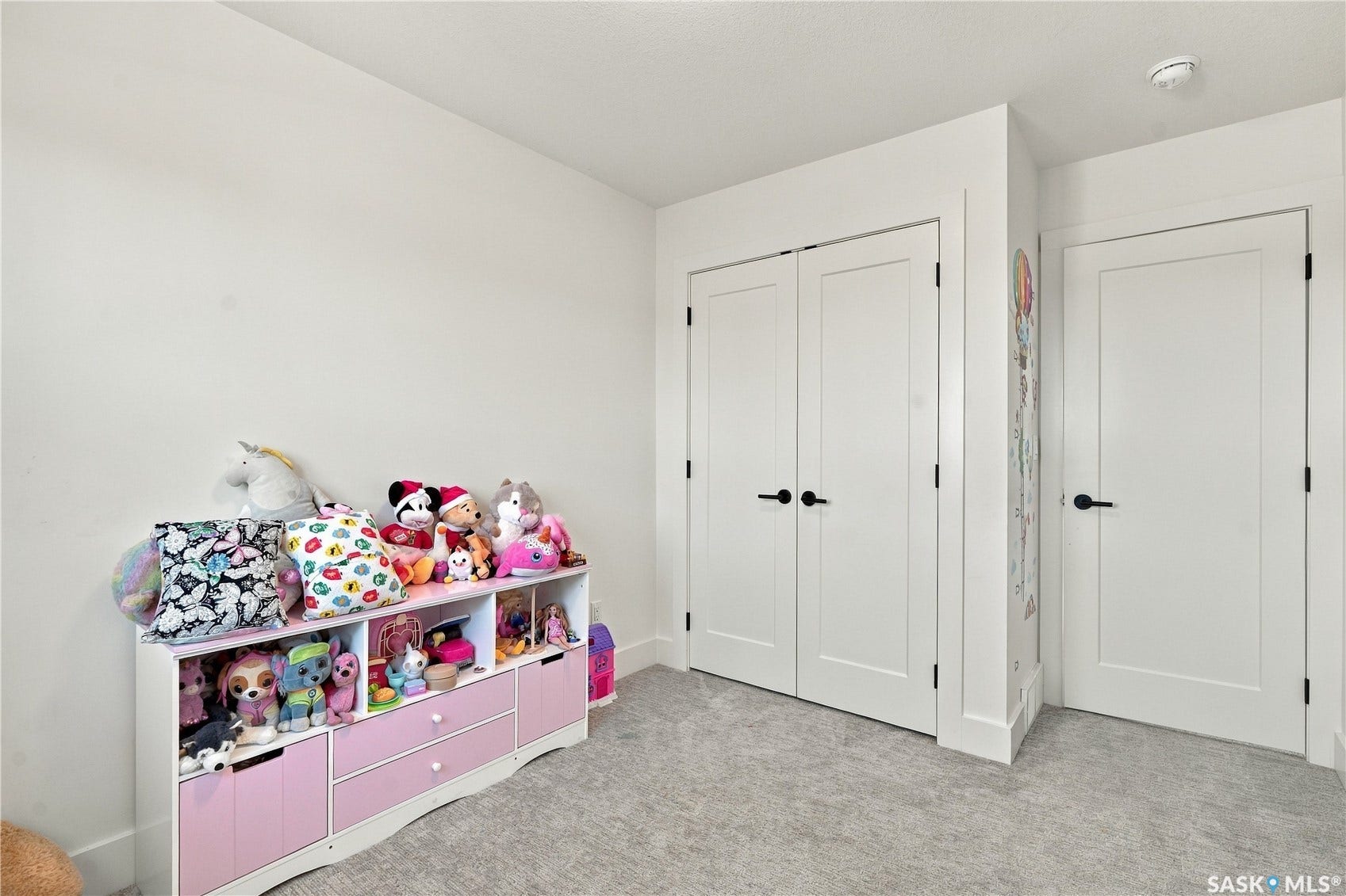 White wall finishes with carpet flooring