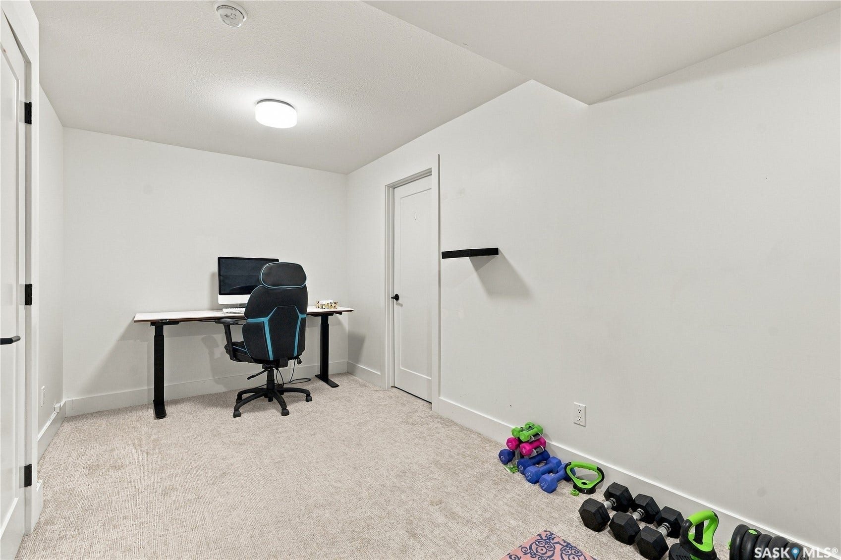 Recessed ceiling lighting, white interior doors, and clean wall finishes