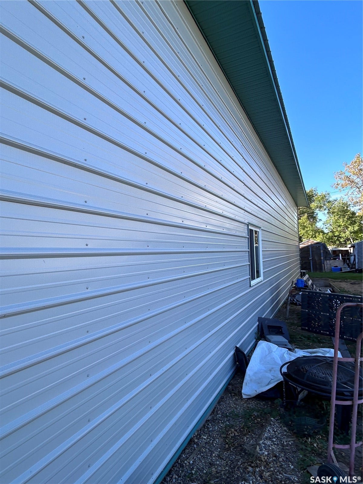 207 1st Street, North Portal SK S0C 1W0 Metal siding exterior with a single window