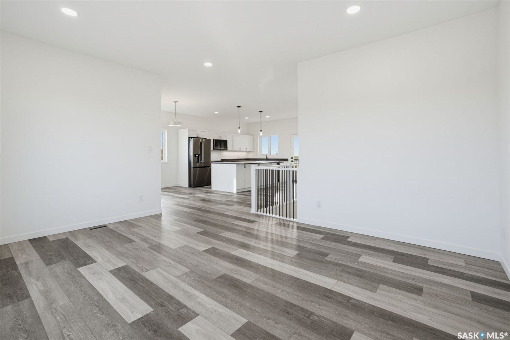 Wood-finish plank flooring throughout