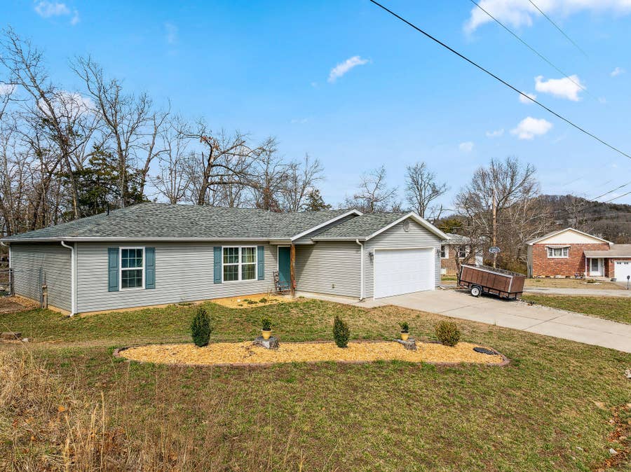 Property photo for 5037 Redbud Drive, Merriam Woods, MO