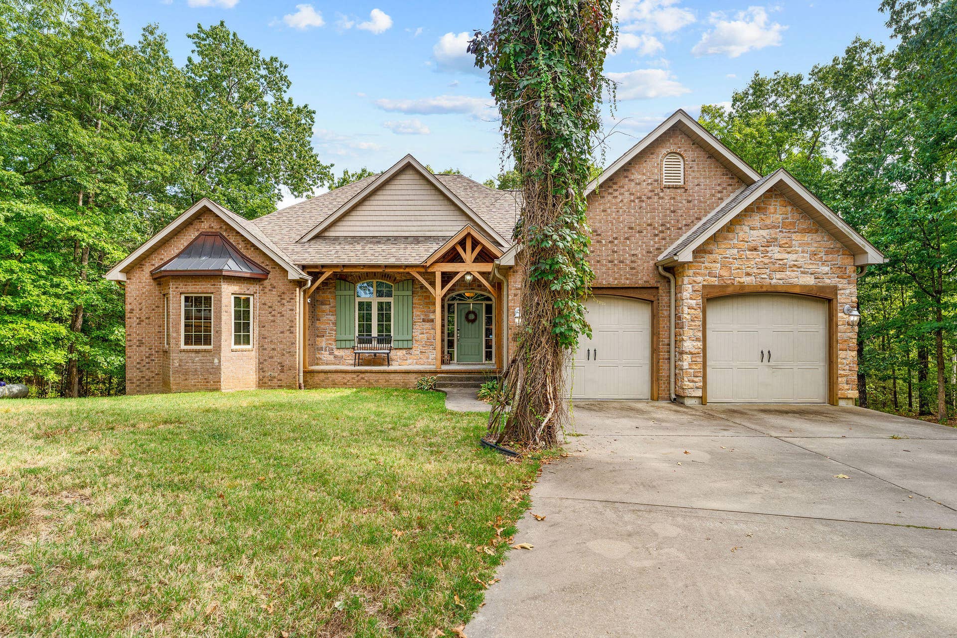 2296 Talking Rocks Road, Branson West, MO 65737 Brick and Wood Beams