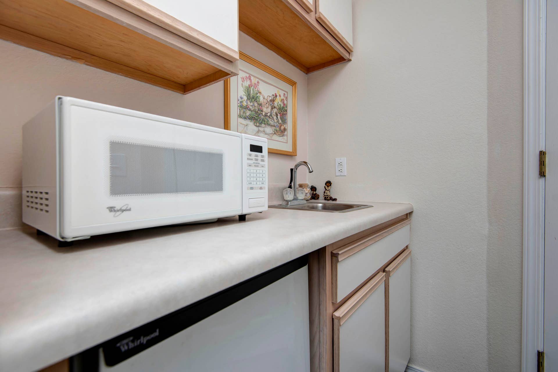 Mini fridge and microwave in Bedroom 2