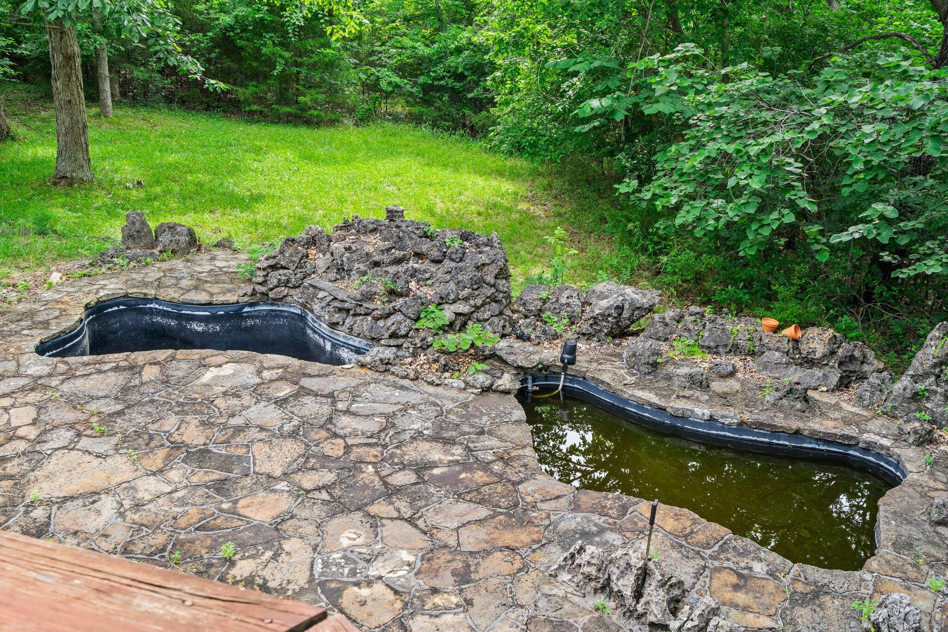 128 Moonvalley Drive, Reeds Spring, MO 65737 128-Moonvalley-Dr-Koi-Pond-View