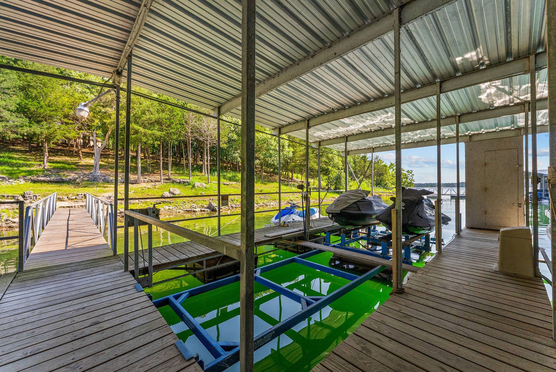 53 Holly Lane, Branson West, MO 65737 1 of 2 Available Slips with PWC Lift