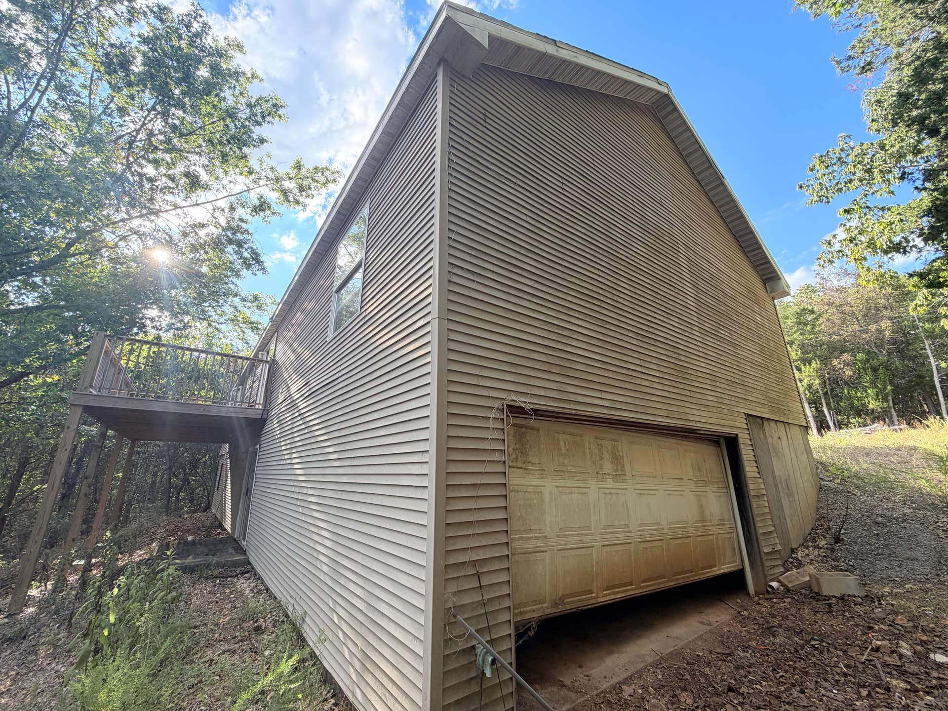 Side of home with garage entrance