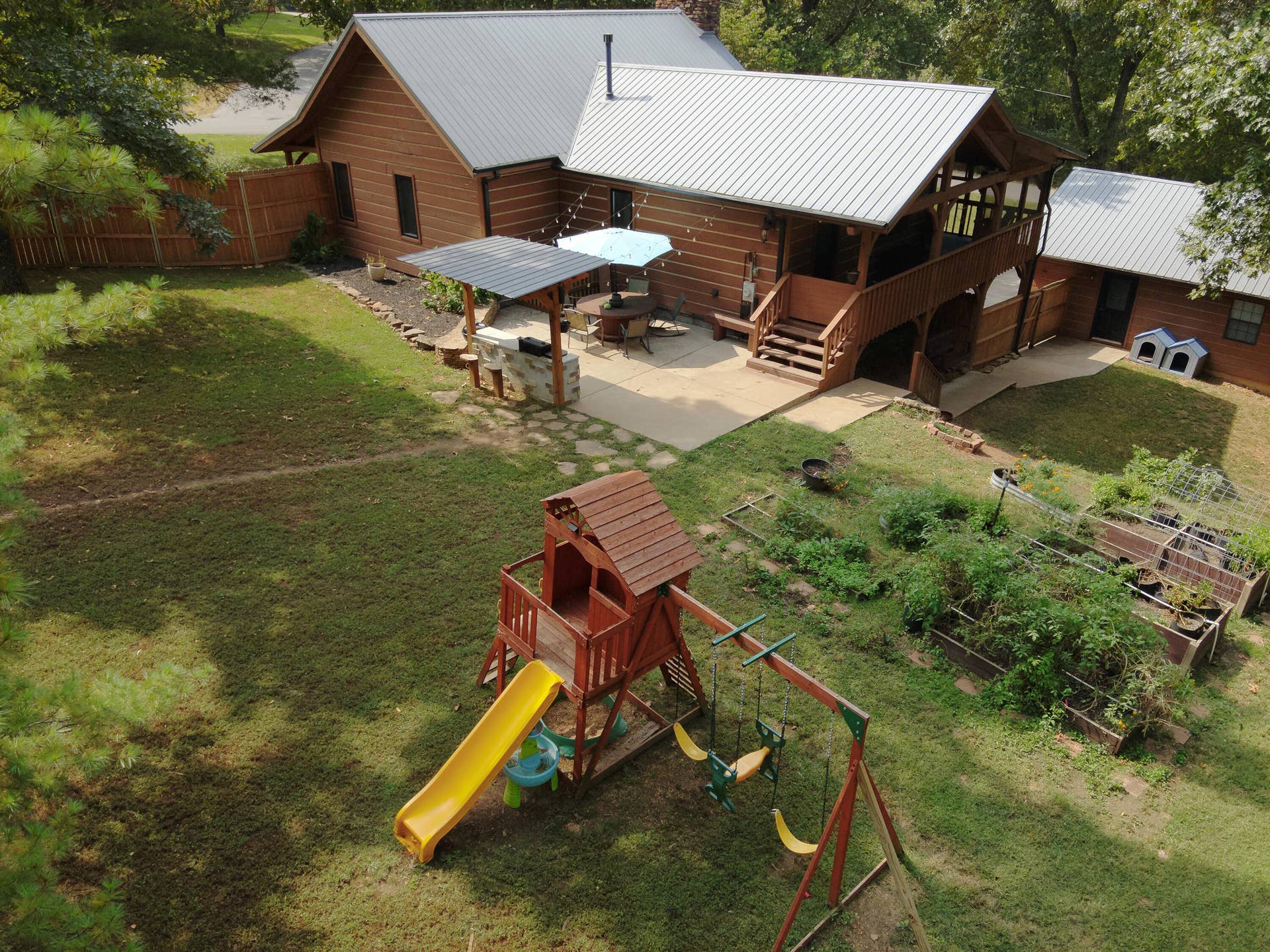 1446 S Oak Hill Court, Nixa, MO 65714 drone back of house closer
