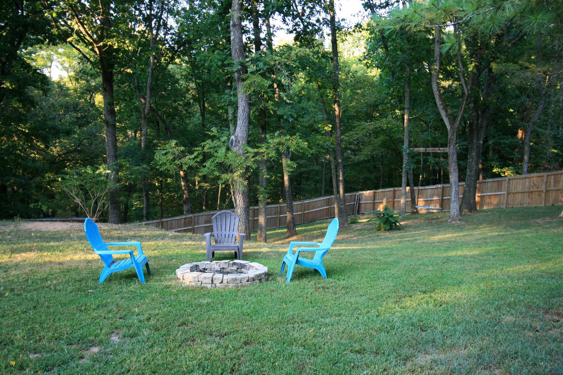 1446 S Oak Hill Court, Nixa, MO 65714 back yard view of firepit