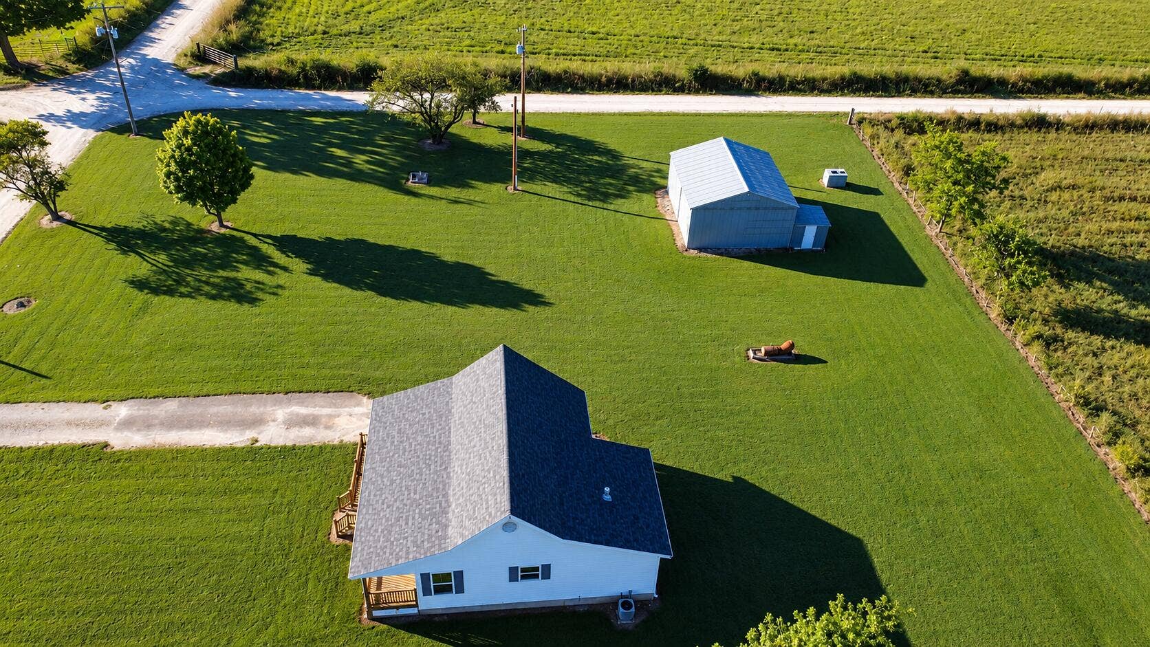 487 E Dade 152, Everton, MO 65646 SunnyAerialViewofRuralHomestead
