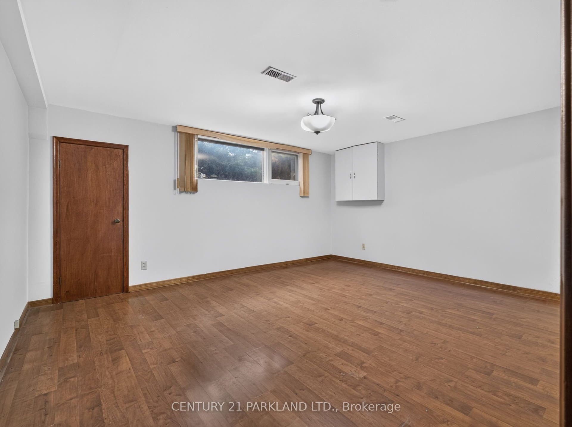 Large High Ceiling + Sunlit Basement