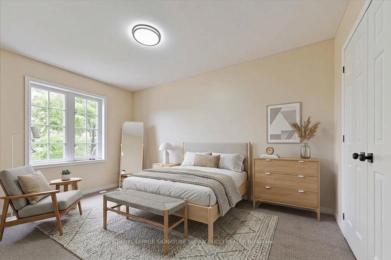3rd flr front West bedroom- tree lined view
