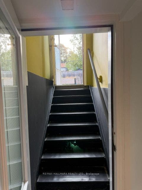 18 Pape Avenue, #basement, Toronto E, Toronto ON M4M 2V6 stairs into apartment