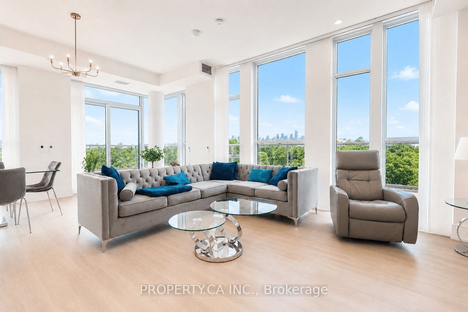 Living room with floor/ceiling windows facing golf