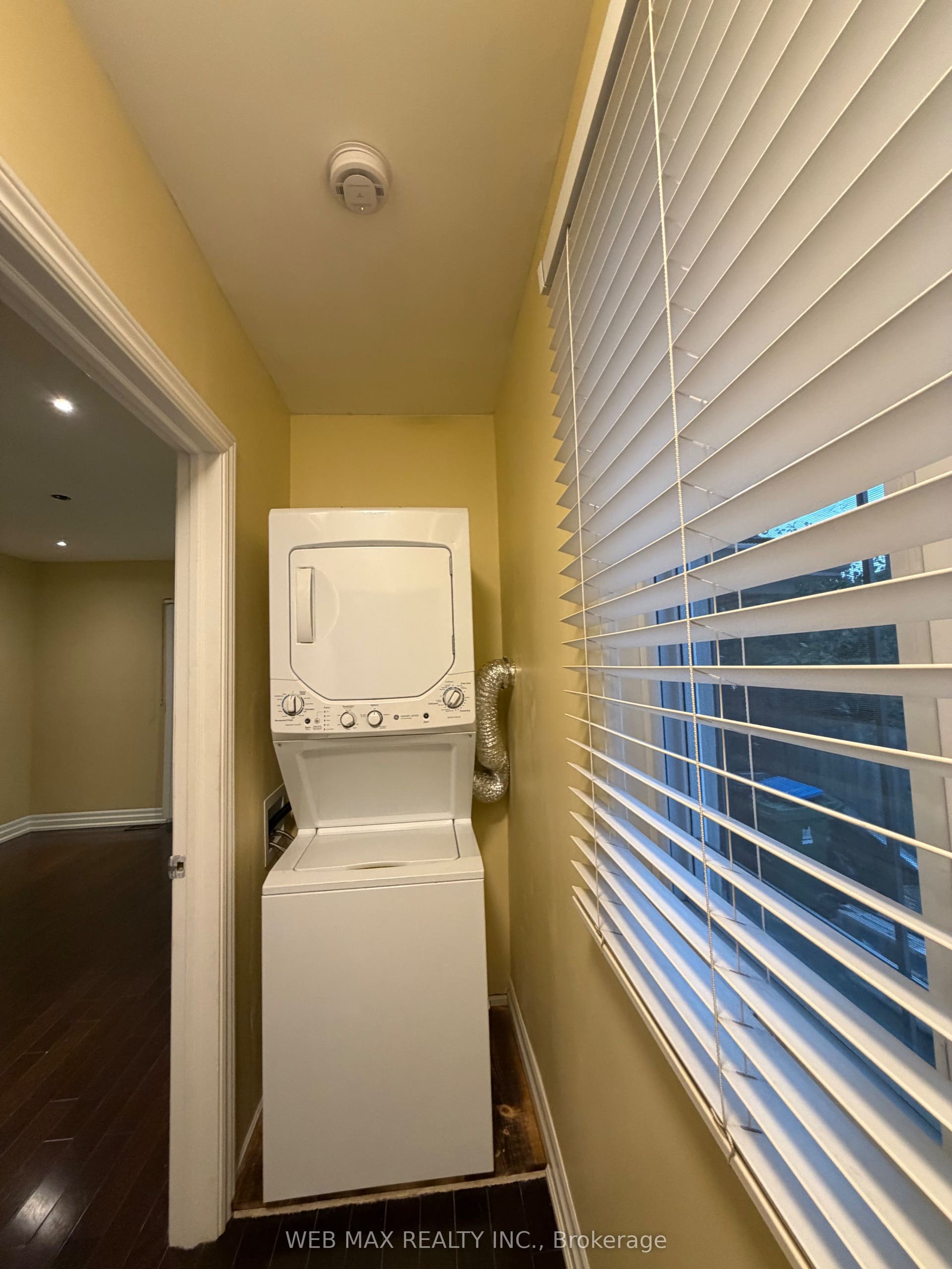 15 Branstone Road, #Main, Toronto W, Toronto ON M6E 4E3 Laundry area near kitchen