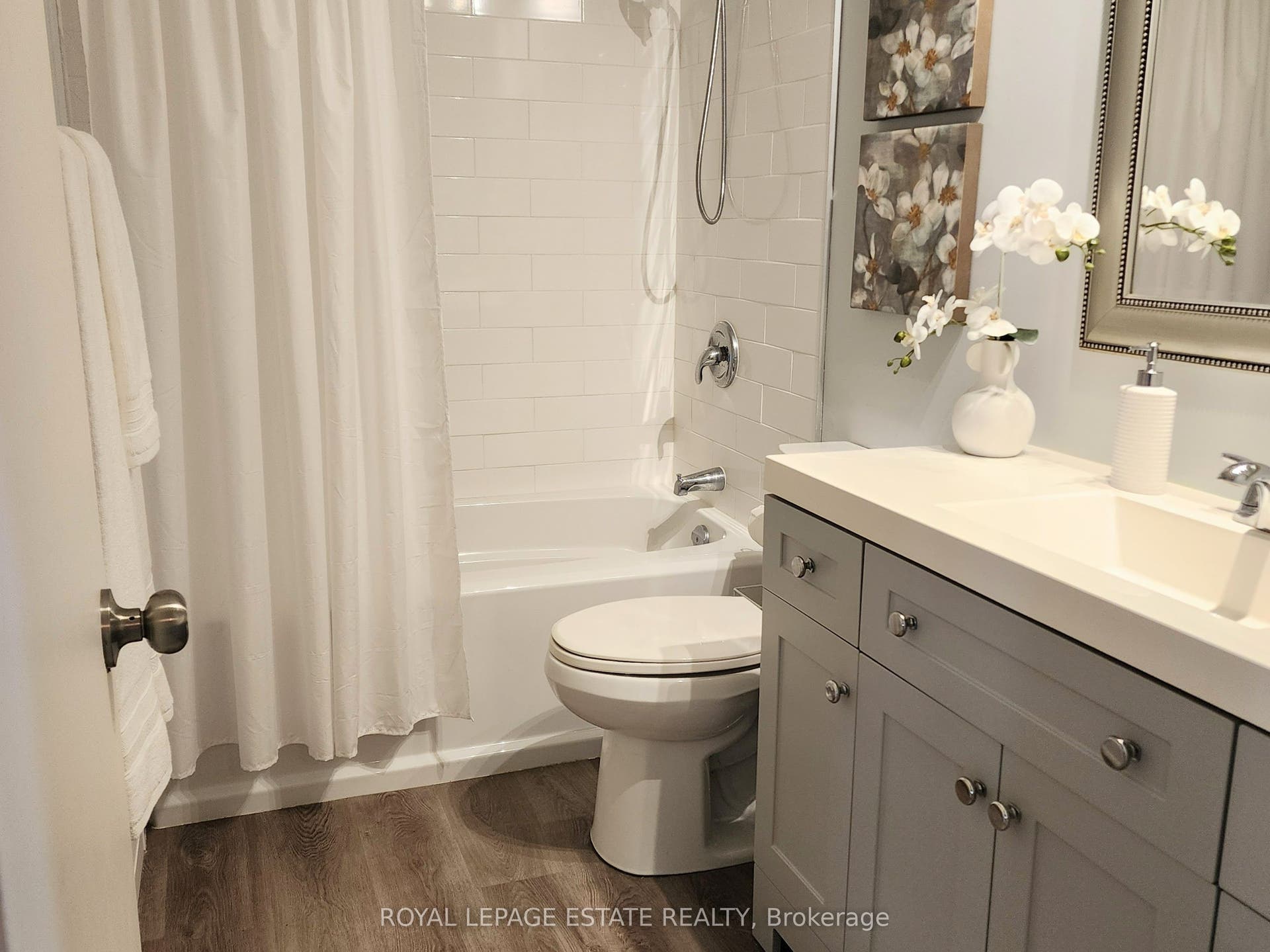 Renovated bathroom with tub and shower