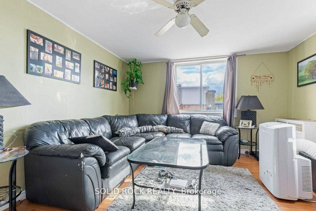 Huge living room with 2 windows-west/south