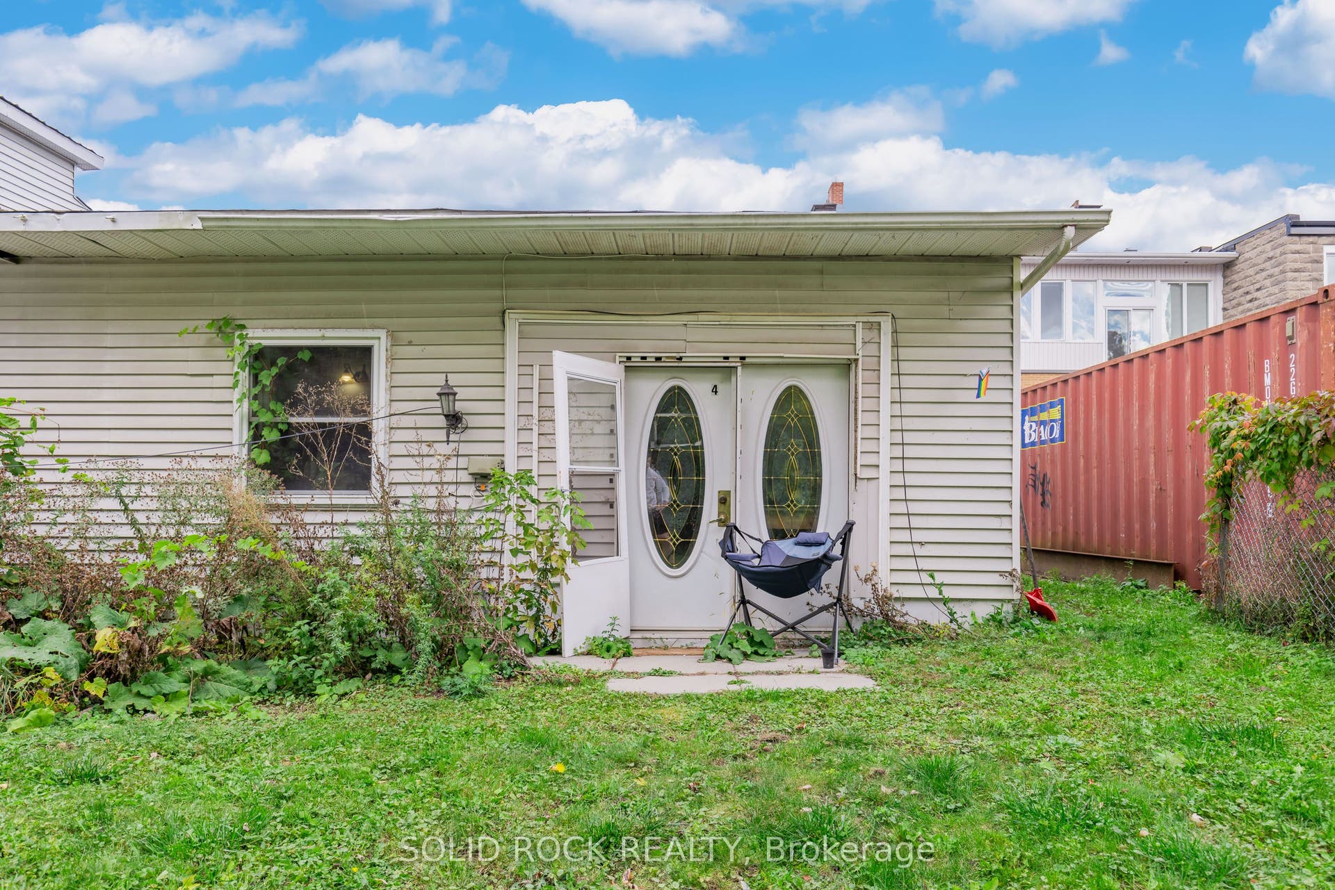 French doors lead to Bachelor apt