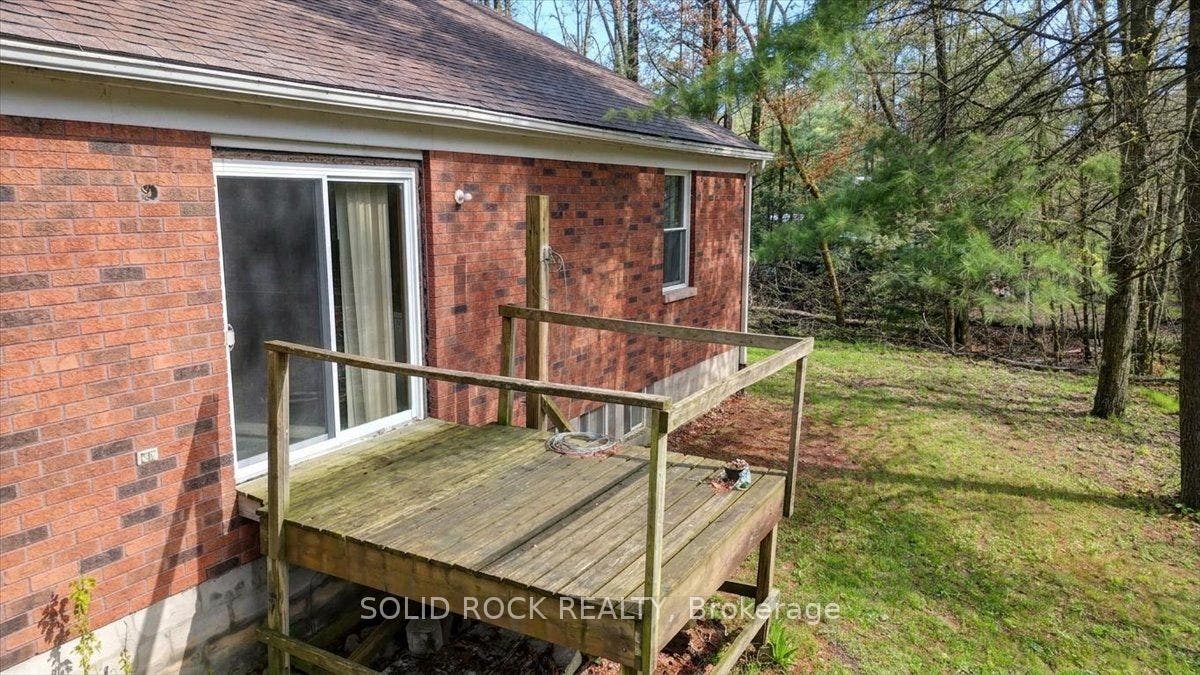 Patio Doors off Kitchen to Back Yard & Deck