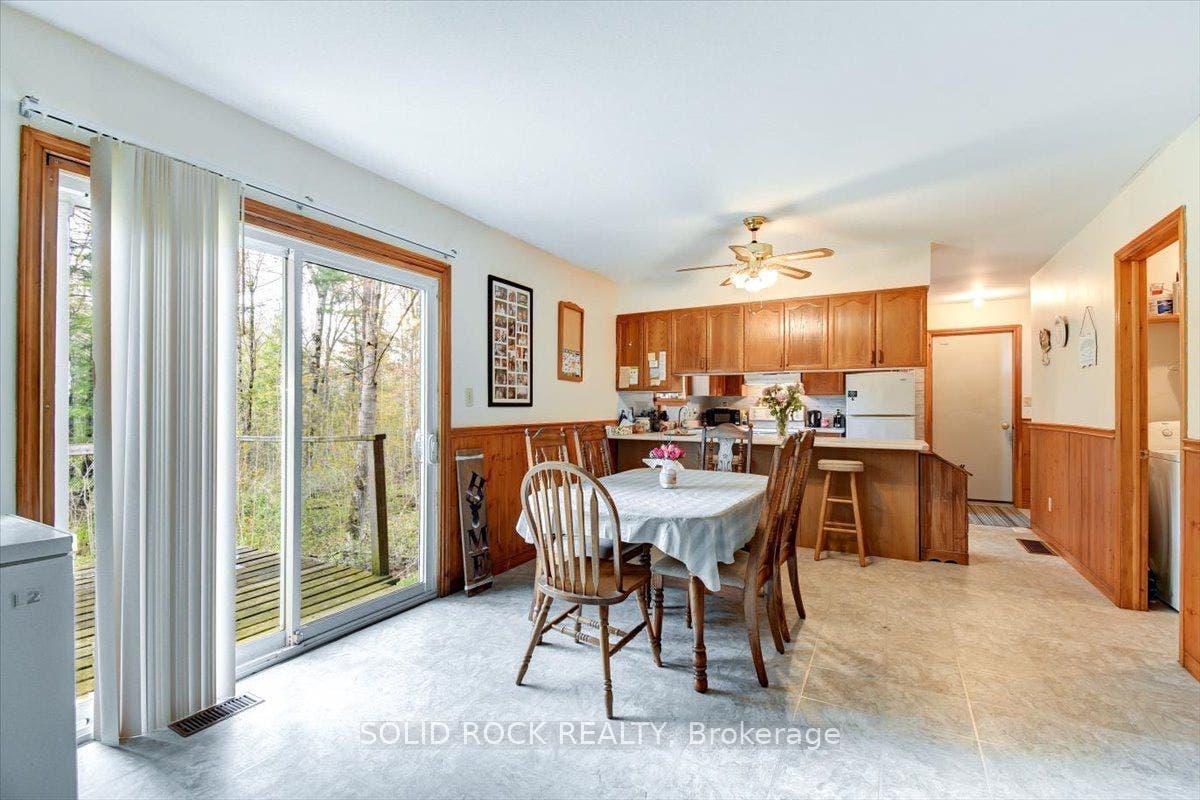 Kitchen is combined with Dining Rm & Patio Doors