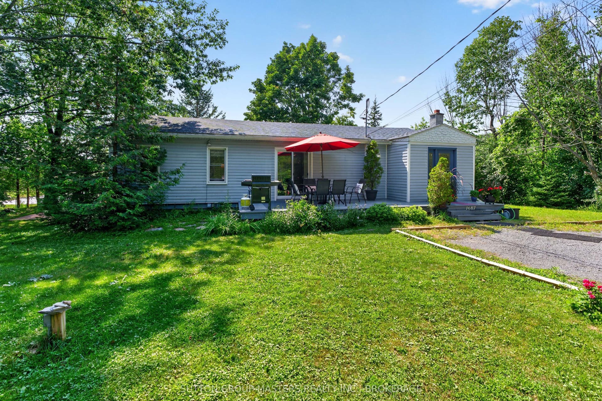 1687 Harten Lane, Kingston, Frontenac ON K7L 4V1 Splendid landscaping and curb appeal.