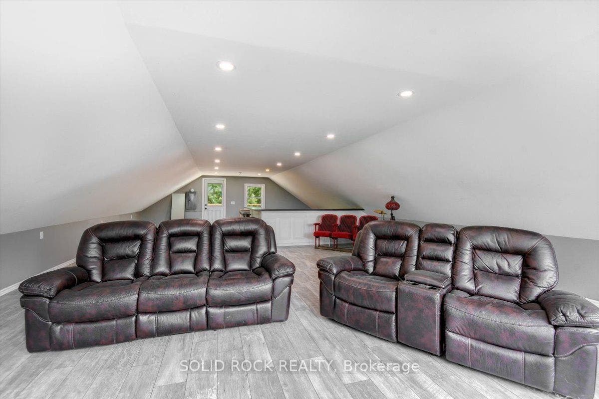 Loft With Picture Window & Exit to  Balcony