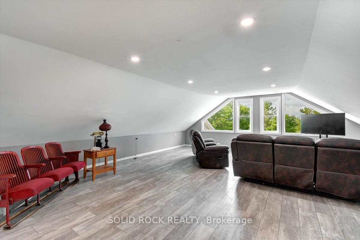 Loft With Picture Window & Exit to  Balcony