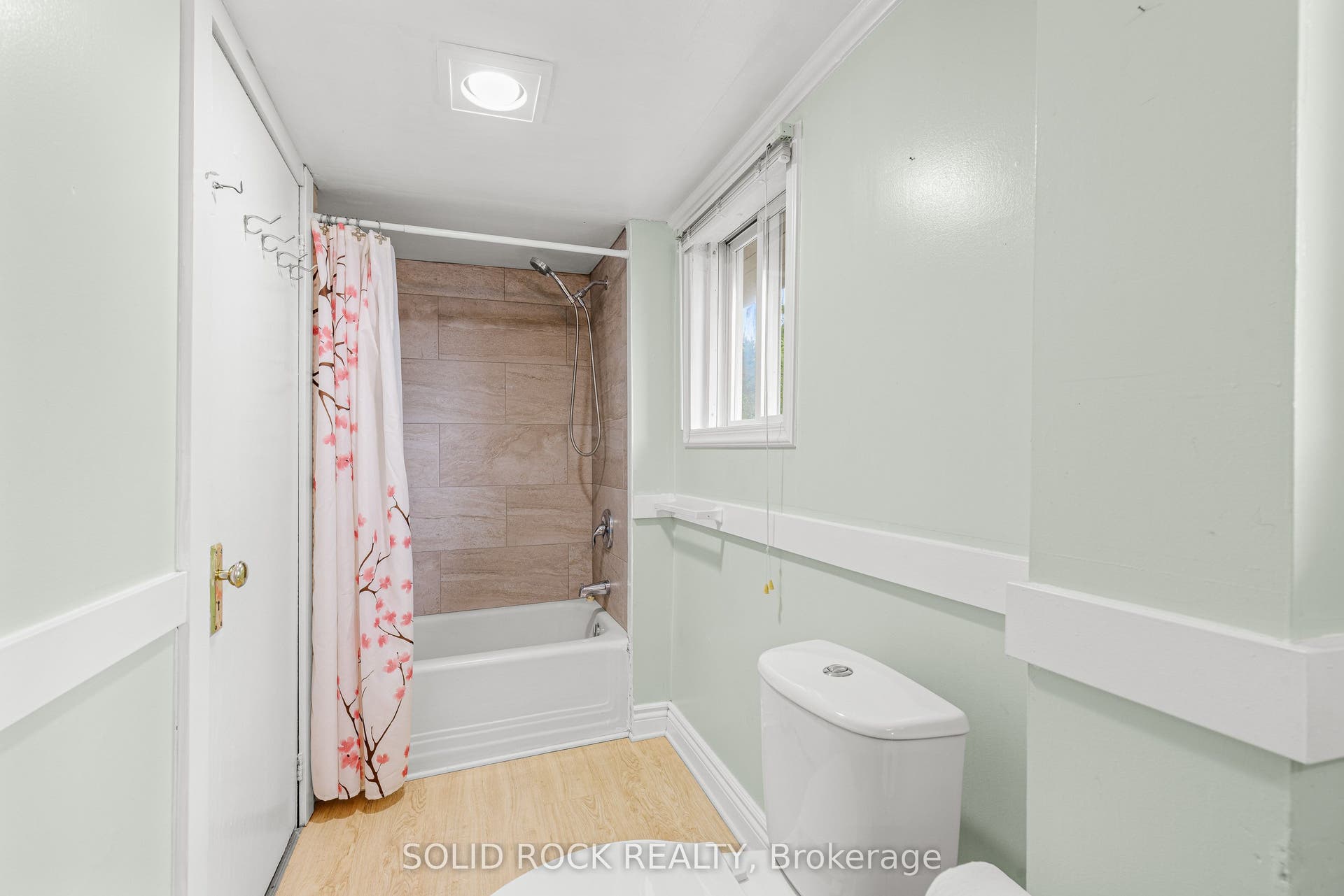 4-piece bath with new tile around tub