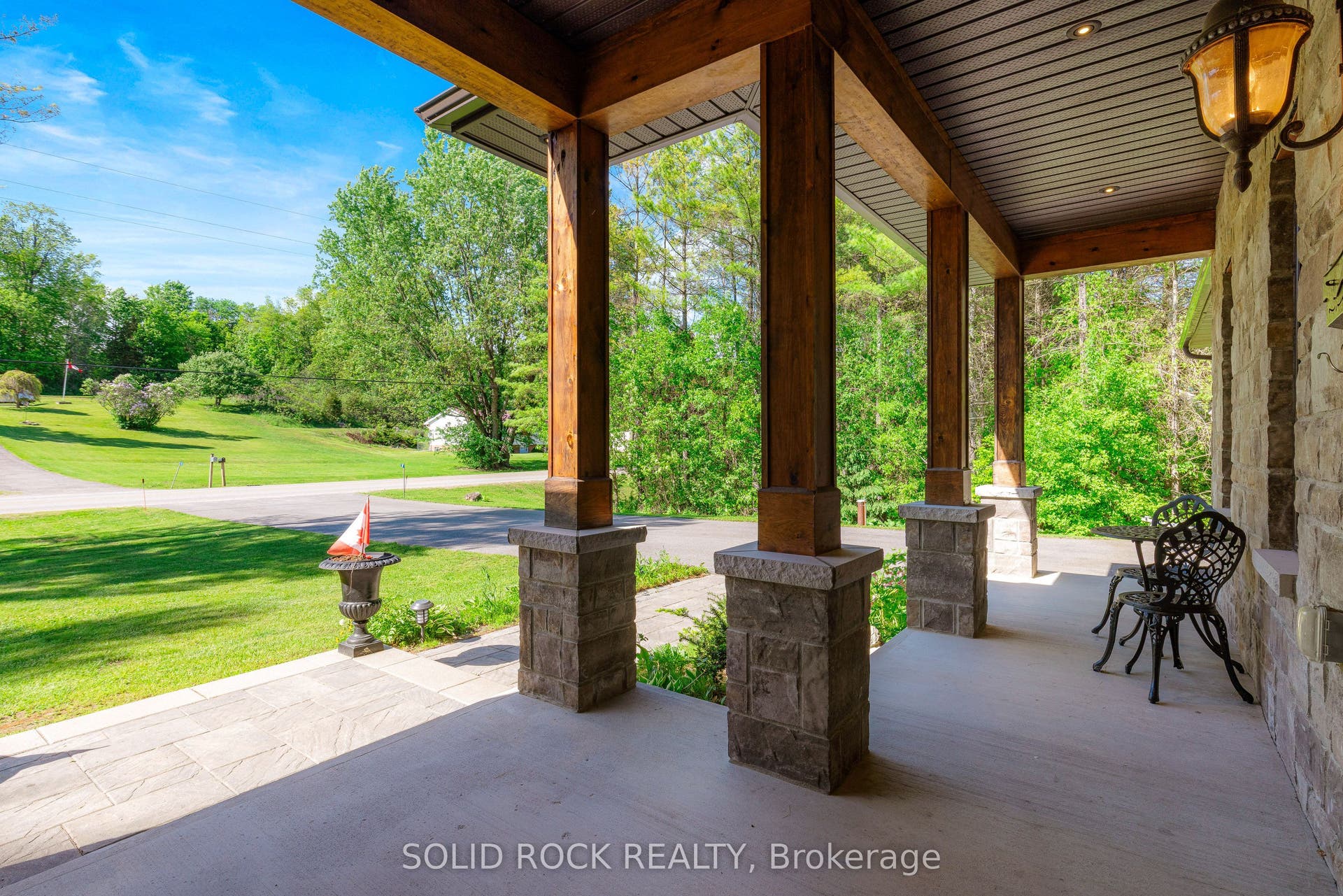 717 Upper Oak Leaf Road, Athens, Leeds And Grenville ON K0E 1B0 Ample space to relax on the front patio.