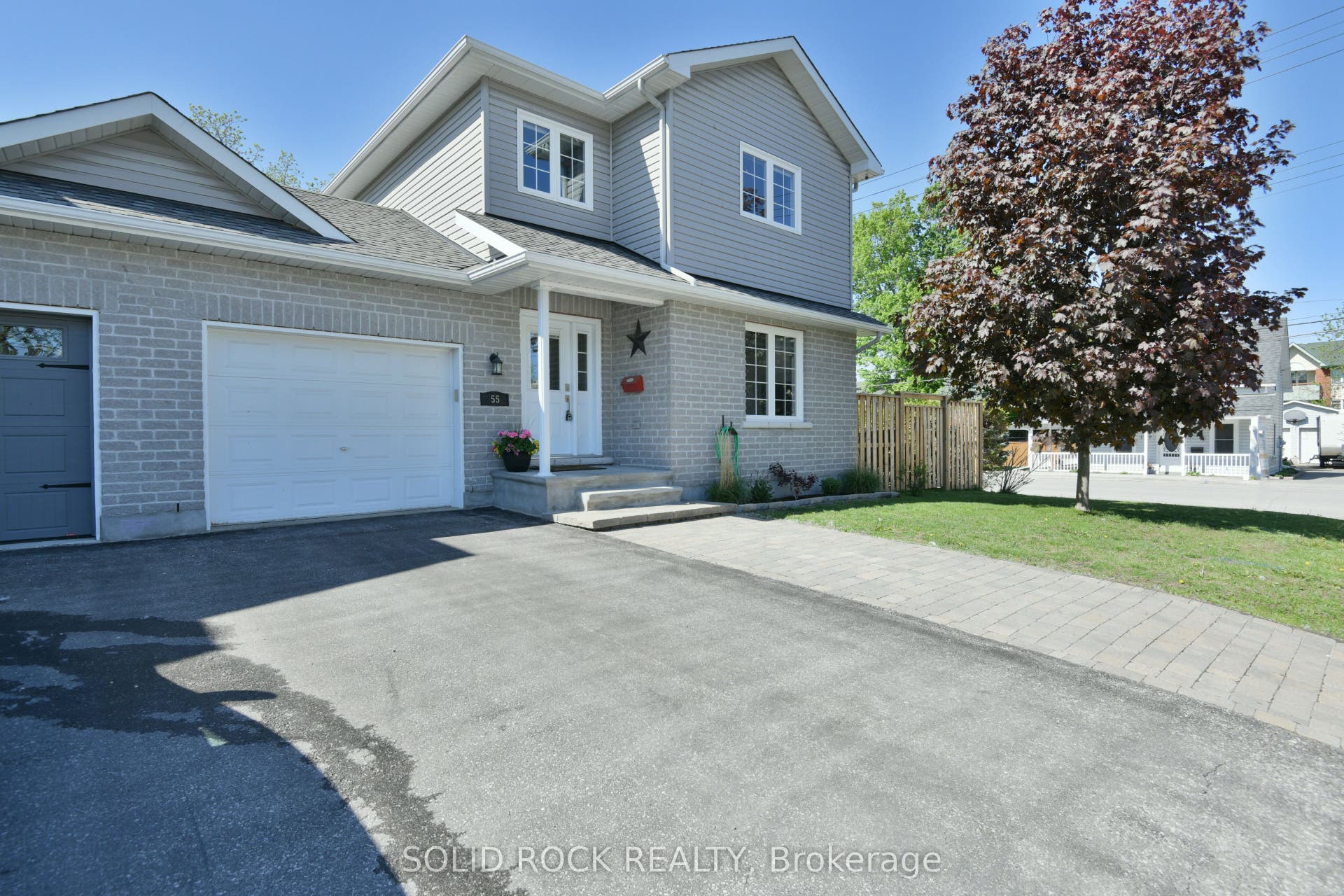Extra parking with interlock patio stones.