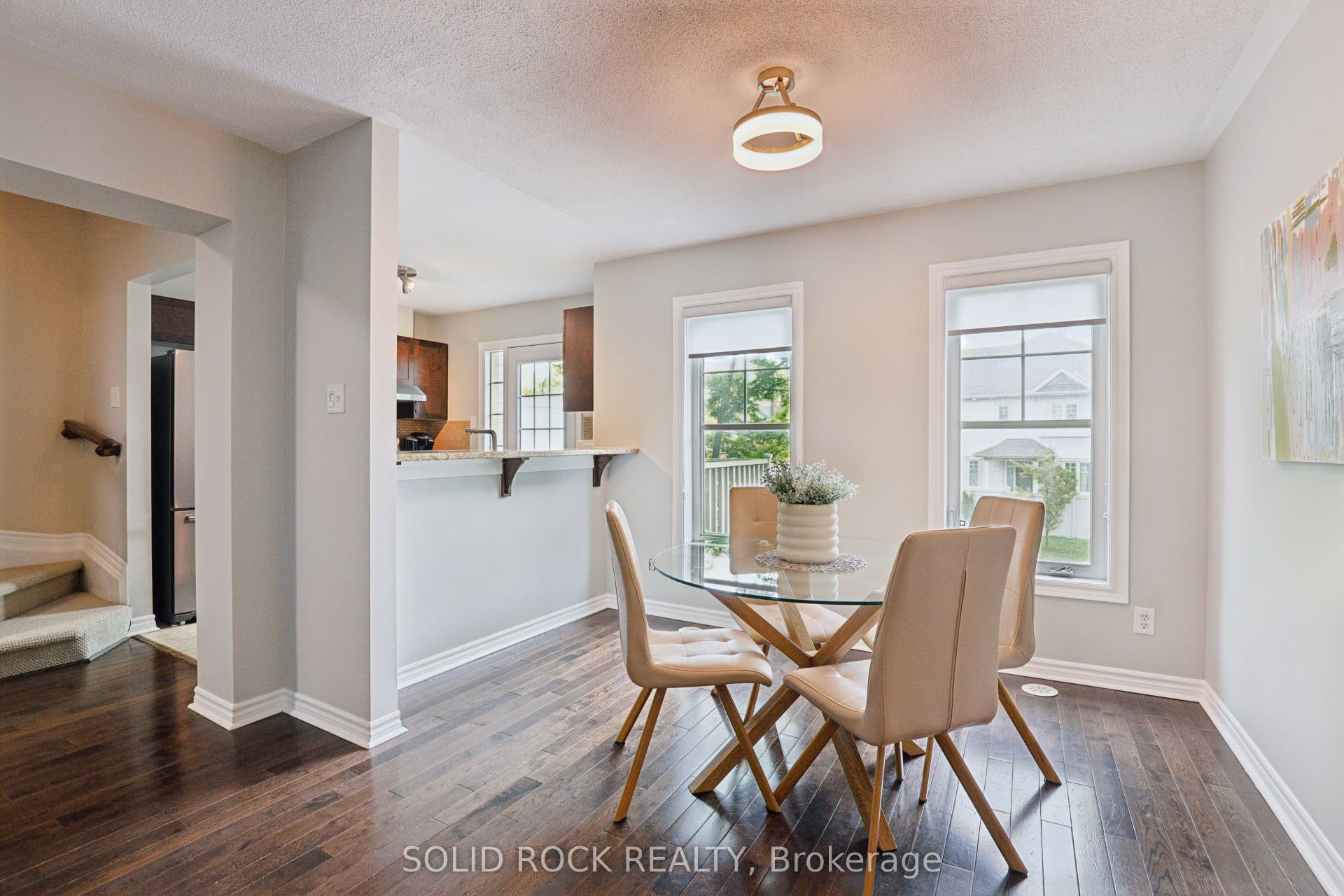 2529 Waterlilly Way, Barrhaven, Ottawa ON K2J 0K2 Breakfast bar in the kitchen to dining room